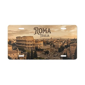 May include: A rectangular license plate featuring a sepia-toned panoramic view of the Colosseum and the historic city of Rome, Italy. The text "ROMA ITALIA" is printed in a dark, stylized serif font centered at the top of the plate.