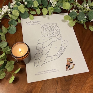 Puede incluir: Un patrón de búho imprimible con 37 secciones numeradas. El patrón es para uso personal únicamente y no puede reproducirse ni venderse. El texto "Owl Pattern" y "The Soldered Otter" está en la parte superior de la página. Una pequeña ilustración de un búho está en la esquina inferior derecha.