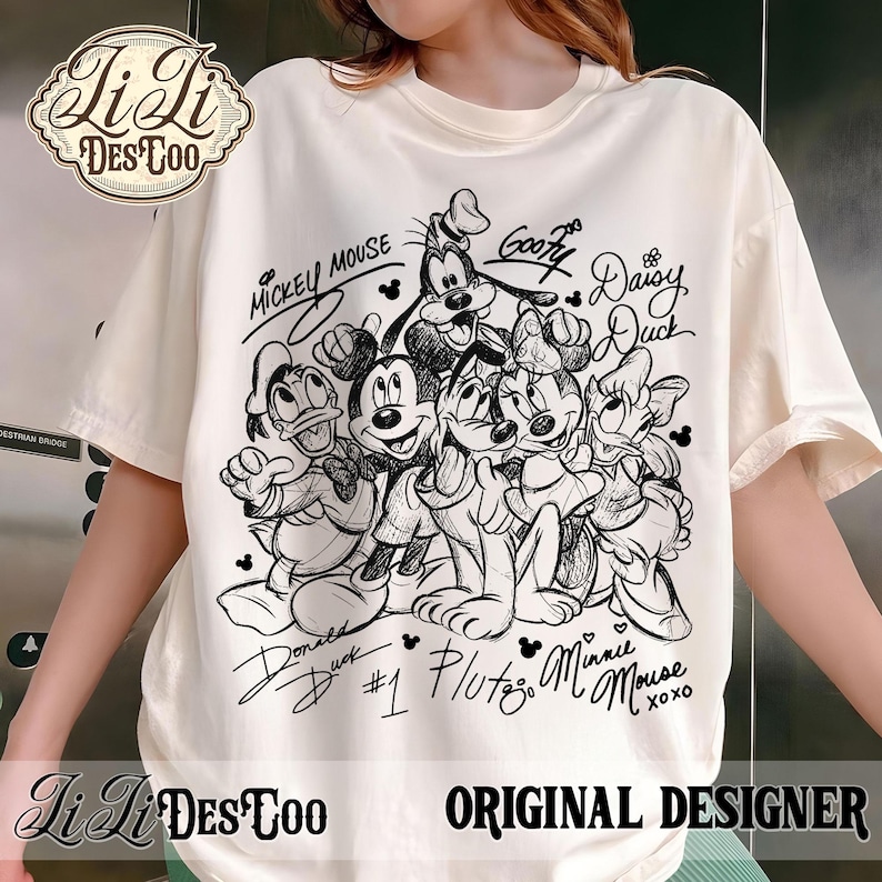 May include: Cream-colored t-shirt featuring a black and white illustration of Mickey Mouse, Minnie Mouse, Donald Duck, Daisy Duck, Goofy, and Pluto. The names of the characters are written above and below them. The shirt also has the text "LiLi DesToo" and "Original Designer".