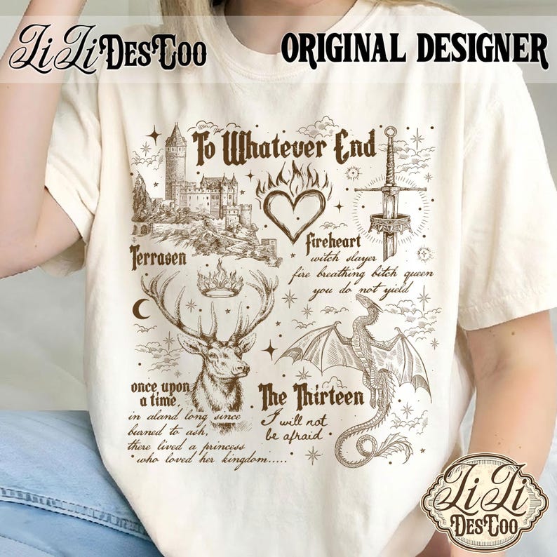 May include: Cream-colored t-shirt with a brown graphic design featuring a castle, deer, dragon, sword, and text. The text includes "To Whatever End," "Terrasen," and "The Thirteen." The shirt also has the text "Original Designer" and the brand name.