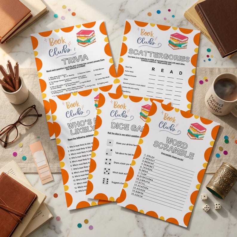 May include: Four printed book club game sheets with orange and white accents, featuring trivia, scattergories, who's likely, dice game, and word scramble activities. A mug with the words "Read More Books" is visible, along with books, glasses, and a pen holder.