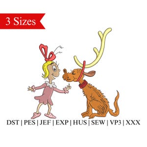 May include: An embroidery design featuring a girl with a red bow and a reindeer. The girl is wearing a pink dress and the reindeer has brown fur and antlers. The design is available in three sizes.