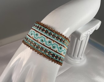 Peyote Stitched Seed Bead Bracelet in  Bronze, Turquoise, White & Gold with Gold Tube Clasp