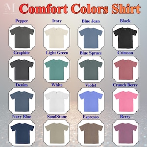 May include: A display of Comfort Colors shirts in various colors, including Pepper, Ivory, Blue Jean, and Black. Each shirt is shown in a different color, with names like Graphite, Light Green, and Denim. The text "Comfort Colors Shirt" is at the top.