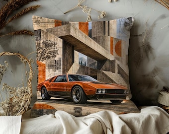 May include: A square throw pillow featuring a printed graphic of a vintage orange sports car parked in front of a concrete architectural structure. The design includes technical engine diagrams and geometric orange accents on a textured background.