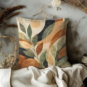 May include: A set of three ceramic mugs with a speckled, matte finish. The mugs are in shades of cream, light gray, and dark gray. Each mug has a simple, minimalist design, perfect for coffee or tea.