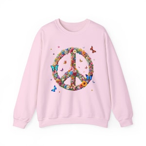 Bluza z kwiatowym znakiem pokoju: boho hipisowska z okrągłym dekoltem i motylem