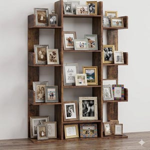 May include: A rustic, dark brown wooden bookshelf filled with framed photographs of various sizes. The frames are in different styles and colors, creating a gallery wall effect. Some photos are black and white, others in color.
