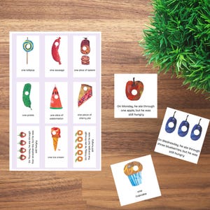 May include: A set of illustrated food cards featuring items like a lollipop, sausage, salami, pickle, watermelon, cherry pie, strawberries, ice cream, oranges, apple, blueberries, and a cupcake. Each card has text from a children's book.