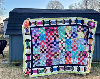 Spools in the nine patch Quilt