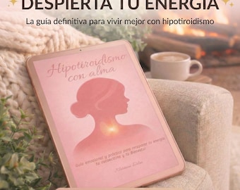 May include: A rose gold tablet displays the cover of an ebook titled "Hipotiroidismo con alma." The cover features a pink silhouette of a woman's profile and neck. The text "DESPIERTA TU ENERGÍA" is at the top. The ebook is on a beige armchair.