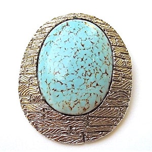 Gabriella Turquoise Convertible Brooch. Vintage Setting. Wszystkie elementy Midnight Starlet są dostarczane w pudełku prezentowym ze wstążką.