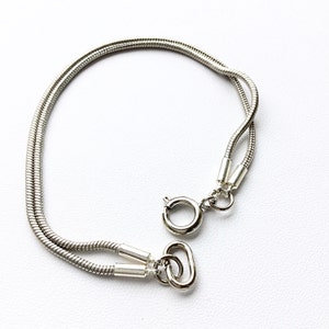 Double Stacked Stainless Steel Snake Chain Bracelet. This piece will arrive with a gift box and ribbon, ready for gift giving. image 3