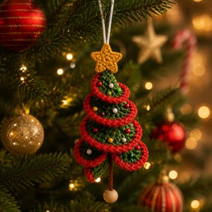 May include: A crocheted Christmas tree ornament featuring a dark green tiered structure with red crocheted edges, small colorful beads, and a yellow crocheted star topper. A white string loop is attached to the top, and a wooden bead hangs below.
