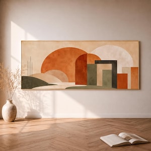 Könnte beinhalten: Ein rechteckiger Wandkunstdruck mit einer abstrakten Landschaft aus geometrischen Formen in den Farben gebranntes Orange, Olivgrün, Beige und Creme. Die Komposition umfasst halbkreisförmige Bögen und horizontal angeordnete Blöcke.