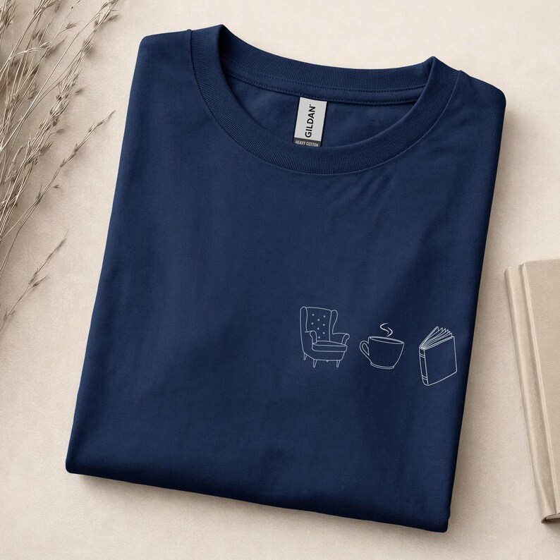 Cozy Reading Shirt – Minimalist T-shirt with armchair, tea and book, tranquil book lover look, gift for bookworms, coziness Navy