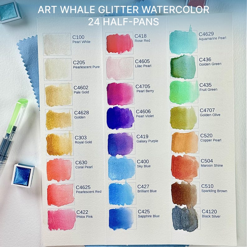 May include: A watercolor paint set with 24 half-pans, featuring a variety of glittery colors. The color palette includes shades of gold, pink, blue, and green. The text "ART WHALE GLITTER WATERCOLOR" is at the top.