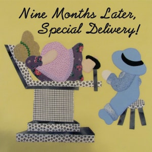 May include: A yellow background with a hand-stitched image of a woman in a hospital bed with a doctor standing next to her. The text "Nine Months Later, Special Delivery!" is at the top of the image.