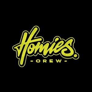 May include: A graphic design featuring the word Homies in a bright yellow, textured, cursive script font with a black outline. Below the word Homies, the word CREW is written in a smaller, yellow, sans-serif font on a solid black background.