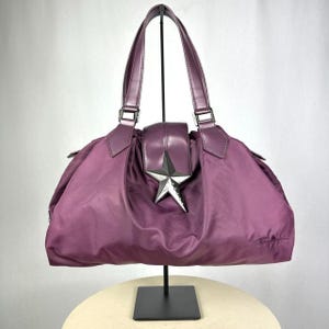 Thierry Mugler „ ZÉNITH TOILE et CUIR 24 “ große Engel-Umhängetasche in weinrot / lila