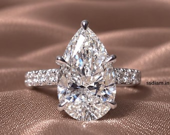 Anillo de compromiso con diamante cultivado en laboratorio en forma de pera y banda pavé. Anillo de boda personalizado con diamantes certificados por IGI. Regalo ideal para ella.