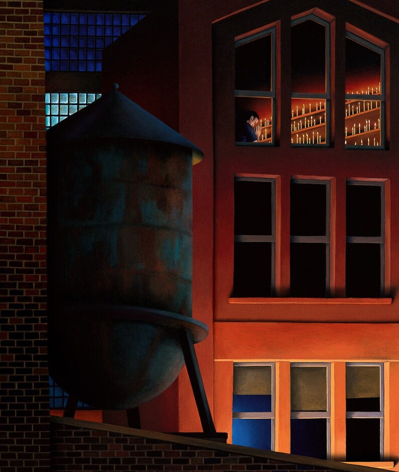 May include: A dark blue water tower with a rounded top sits in front of a red brick building with windows. The windows are lit from inside, and one window shows a person looking out.
