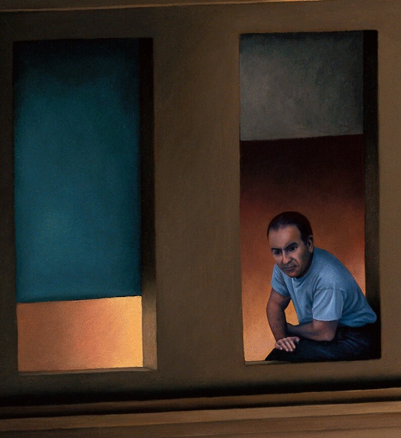 May include: A man in a blue shirt sits in a window, looking out at the viewer. The window is framed in wood and has a blue and orange background.