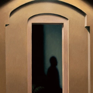 May include: A shadowy figure stands in a doorway, framed by a light brown arched window with a white trim. The figure is silhouetted against a dark background, with a hint of green foliage visible in the lower left corner.