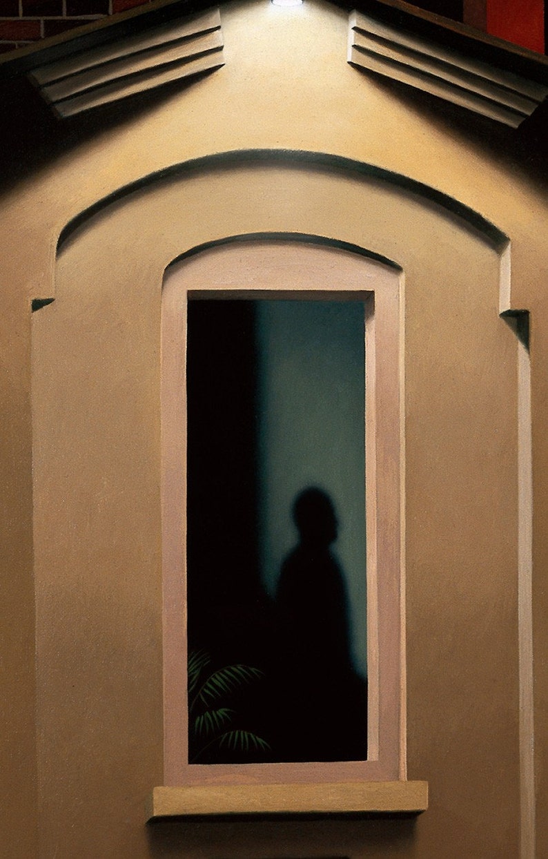 May include: A shadowy figure stands in a doorway, framed by a light brown arched window with a white trim. The figure is silhouetted against a dark background, with a hint of green foliage visible in the lower left corner.