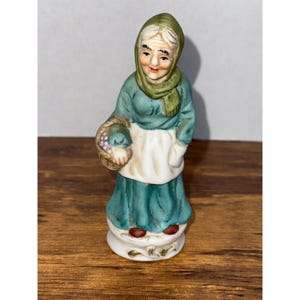Vintage1963 Old Woman Figurine with Fruit Basket