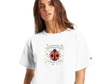 I am Still Learning Lady Bug - Women's Cropped Heritage Crewneck T-Shirt | Champion T453W