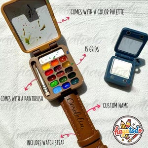 以下が含まれることがあります： カラーパレット、15グリッド、筆付きの茶色の時計。時計のストラップは、名前「Cordelia」が刻印された茶色の革製です。時計にはカラーパレットとカスタムネームオプションが含まれています。