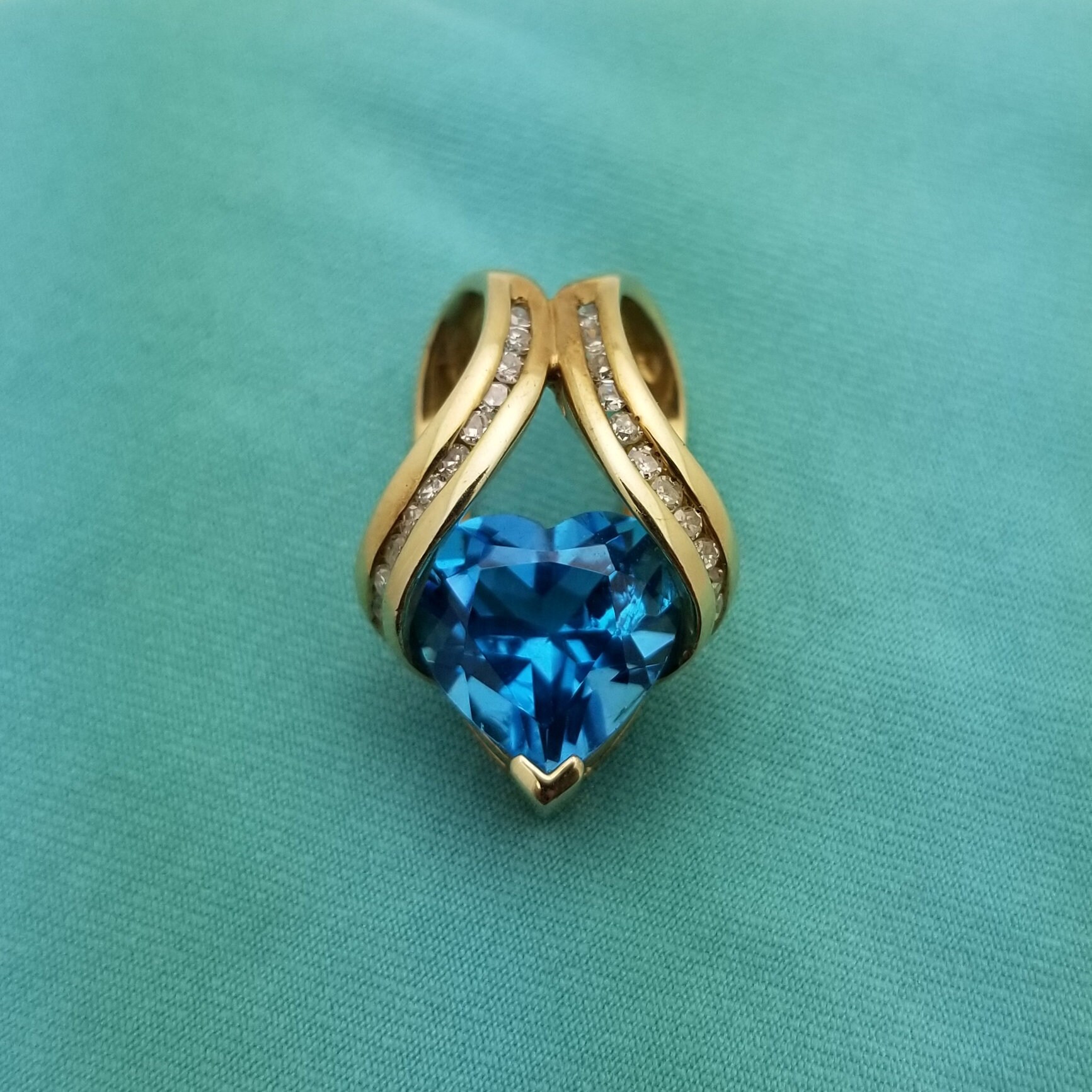 10K Yellow Gold Blue Topaz Heart Pendant - .15CTW Diamond