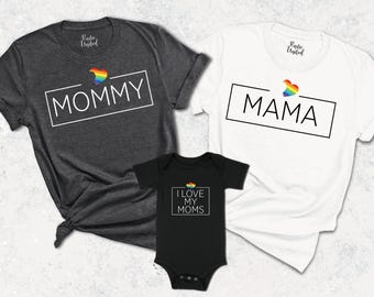 May include: Three shirts with a rainbow heart design and text. The shirts say "Mommy", "Mama", and "I Love My Moms".