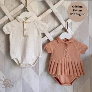 May include: Two knitted baby rompers hanging on white hangers. One is cream-colored with a polo collar and three buttons. The other is peach-colored with a polo collar, three buttons, and a pleated skirt. Text reads: Knitting Patten PDF English.