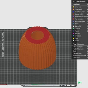 Puede incluir: Un modelo 3D digital de un objeto acanalado en forma de campana con una base ancha y una abertura circular en la parte superior. El objeto se muestra en naranja con un borde interior rojo sobre una placa de construcci&oacute;n con patr&oacute;n de rejilla.