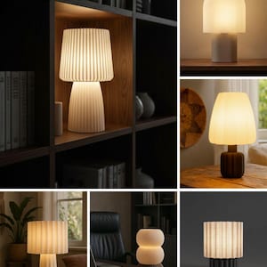 May include: A collection of table lamps featuring various designs, including fluted shades and bases in white, brown, and dark gray. The lamps emit a warm, soft glow, showcasing different shapes such as arched, cylindrical, and stacked spherical forms.