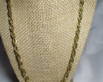 A Vintage Heavy, 24 Inch Twisted Rope Style Chain in a Gold Tone.