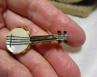 A 1960's Little BANJO Pin/Brooch with a Mother of Pearl Face.