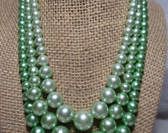 1960's Triple Strands of Shimmering Light Green and Medium Green Shimmering Simulated Pearl Necklace.