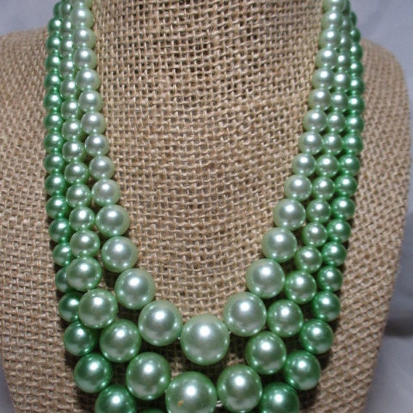 1960's Triple Strands of Shimmering Light Green and Medium Green Shimmering Simulated Pearl Necklace.
