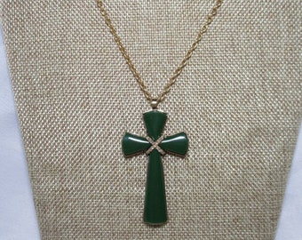 A Vintage AVON Large, Jade Green Colored Cross on Long Gold Tone Chain.