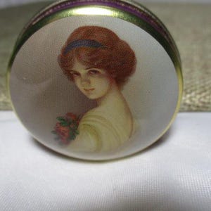 A Vintage Lovely Victorian Styled Lady on the Lid of Chambers Candy Company in England Miniature Round Tin.