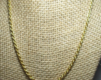 A Slender, Vintage 18" Gold Tone Rope Chain Necklace.