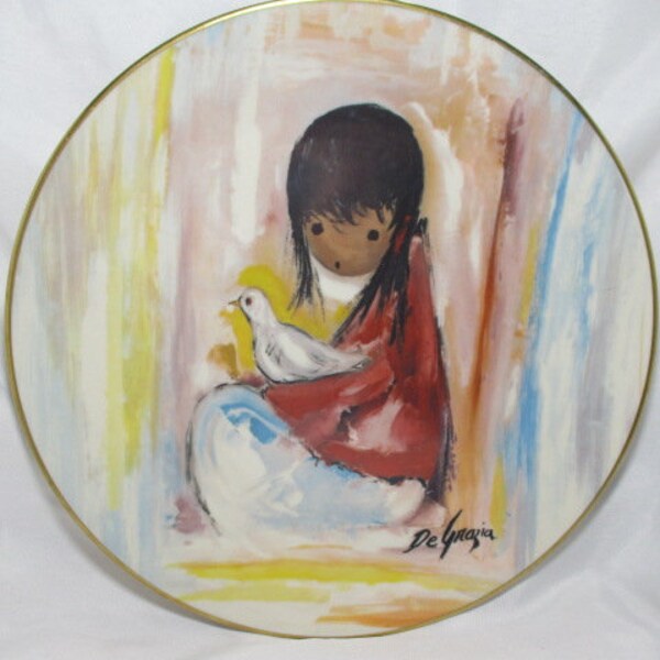 A 1977 TED DE GRAZIA Gorham Fine China "The White Dove" Collectors Plate Of Young Native American Child & Dove.