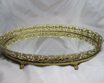 A 1970's Oval, Golden Floral-edge Vanity Tray with Mirrored Insert.