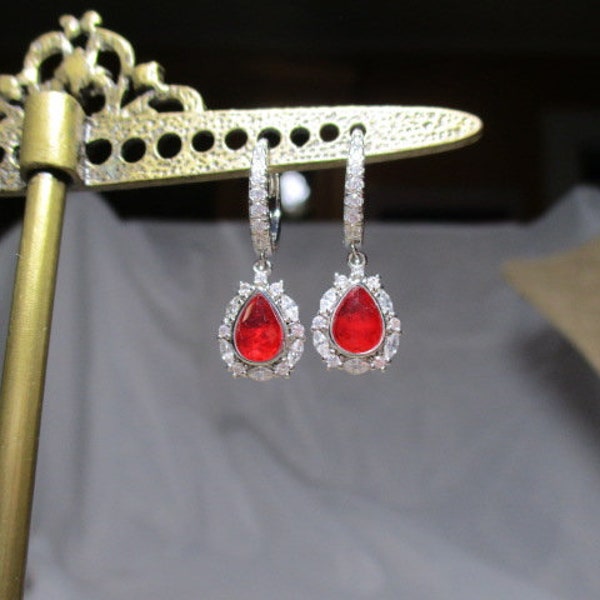 A Pair of Vintage RING BOMB PARTY Brand Simulated Ruby and Diamonds Dangle Earrings.