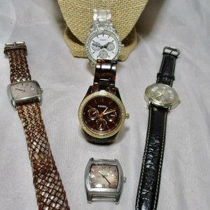 A Vintage Grouping of Five Fossil Brand Ladies Wrist Watches.