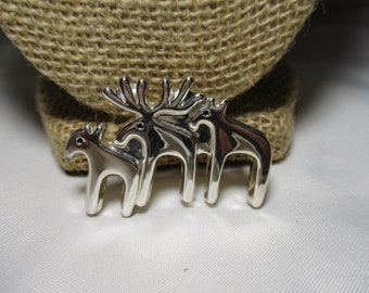 A Vintage BEST BRAND Family of Moose Brooch/Pin and Pendant in a Silver Tone.