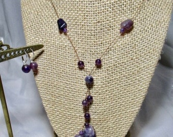 Vintage Set of Amethyst Beaded Necklace with  Amethyst Bead Earrings .